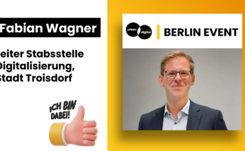 Warum Troisdorf ein Smart-City-Maskottchen hat: smarTa im Gespräch mit Fabian Wagner Fabian Wagner, Leiter Stabsstelle Digitalisierung Troisdorf, zum Maskottchen smarTa, Artikelbild Netzwerktreffen Berlin