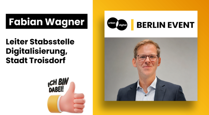 Warum Troisdorf ein Smart-City-Maskottchen hat: smarTa im Gespräch mit Fabian Wagner Fabian Wagner, Leiter Stabsstelle Digitalisierung Troisdorf, zum Maskottchen smarTa, Artikelbild Netzwerktreffen Berlin